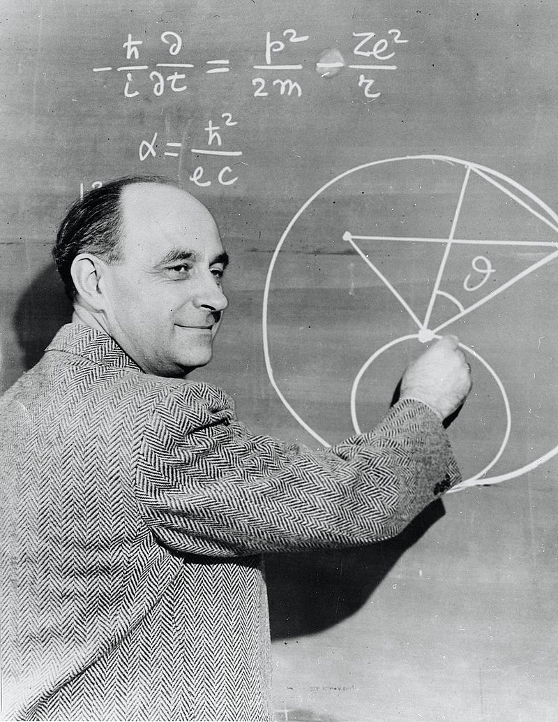 Fermi writing equations on a chalkboard